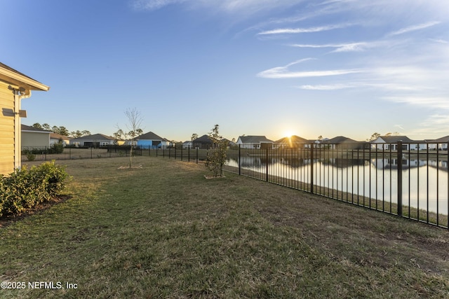 view of yard with a water view