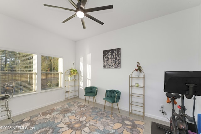 sitting room featuring ceiling fan and light hardwood / wood-style floors