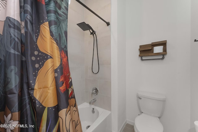 bathroom featuring toilet and shower / bath combination with curtain