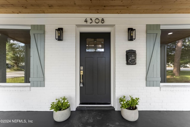 property entrance with a porch