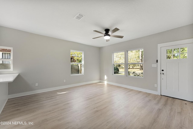 entrance foyer featuring ceiling fan and light hardwood / wood-style flooring