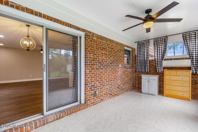 interior space with a ceiling fan