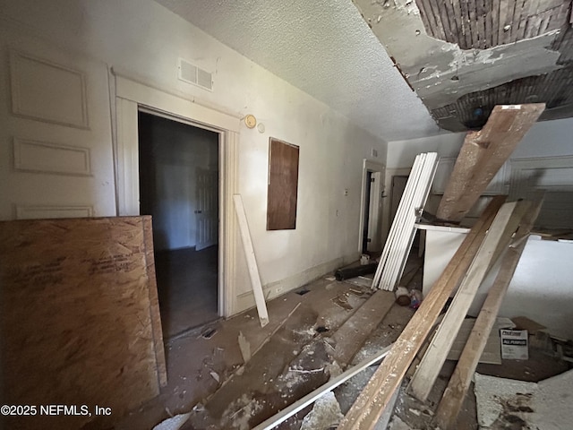 misc room with a textured ceiling