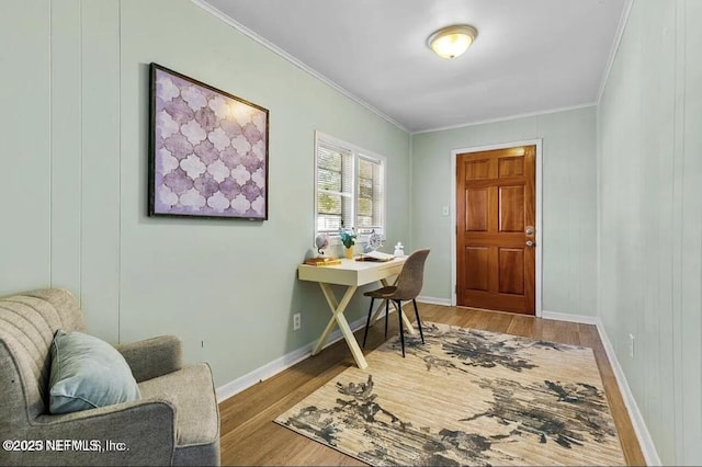 office featuring ornamental molding and hardwood / wood-style flooring