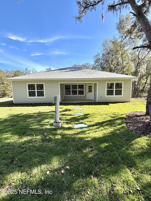 view of front of house with a front lawn