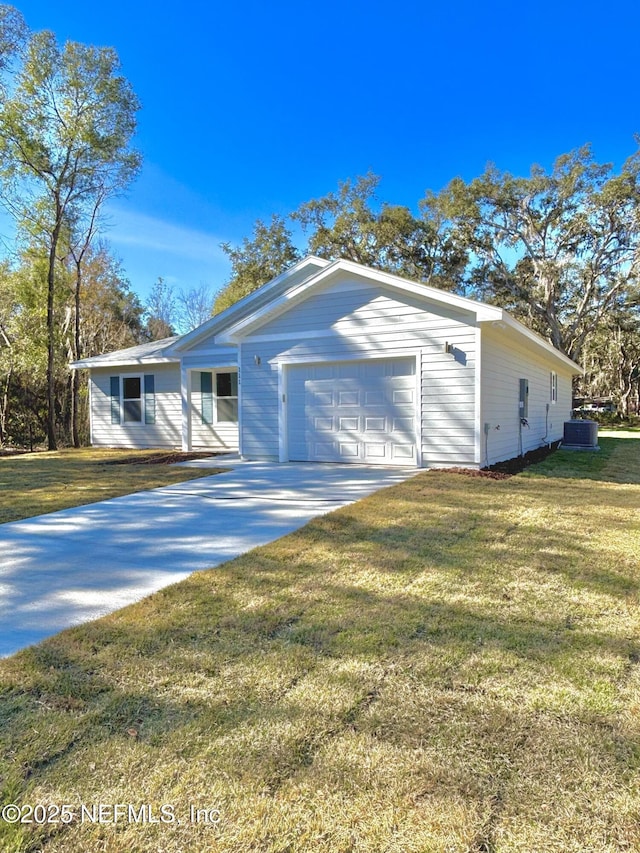 ranch-style home with a front lawn, central AC unit, and a garage