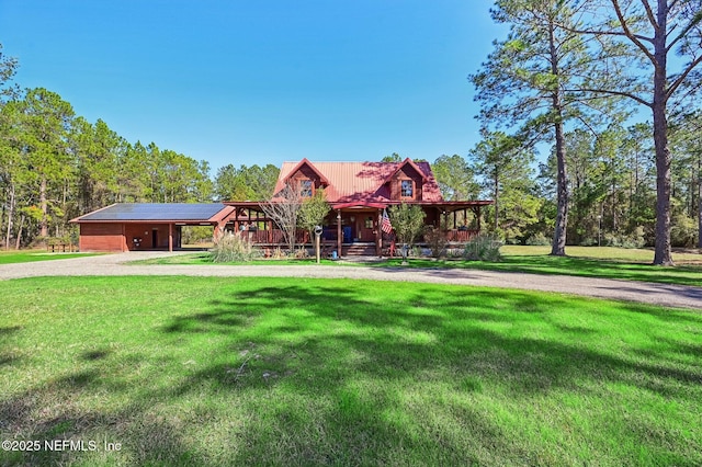 log-style house with a front lawn and a porch