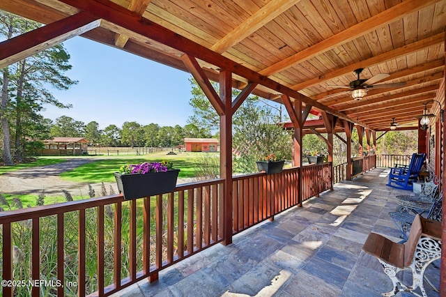 view of patio featuring ceiling fan