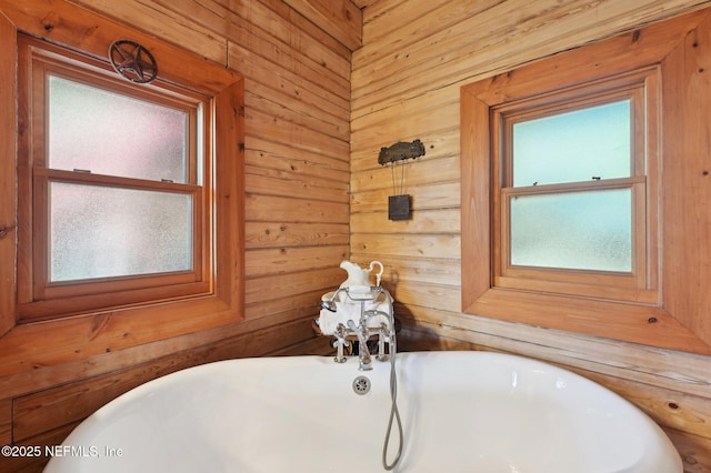 bathroom with a tub