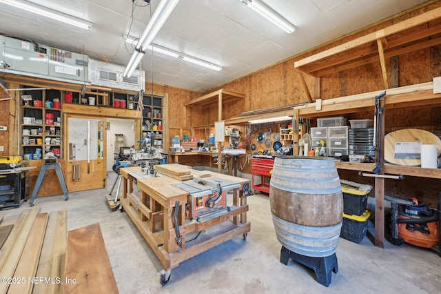 garage with a workshop area