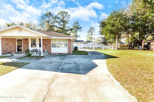 view of front of property with a porch and a front yard