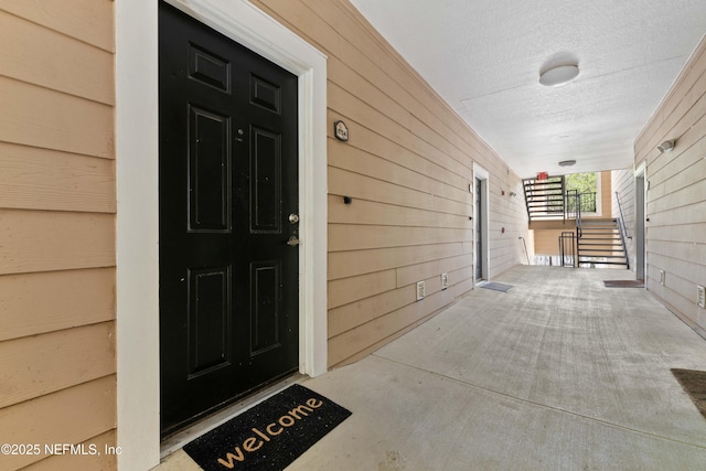 property entrance with covered porch