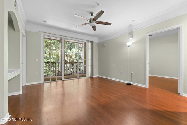 unfurnished room with hardwood / wood-style floors, ceiling fan, and crown molding