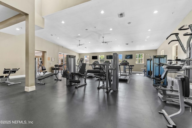 exercise room featuring ceiling fan and lofted ceiling