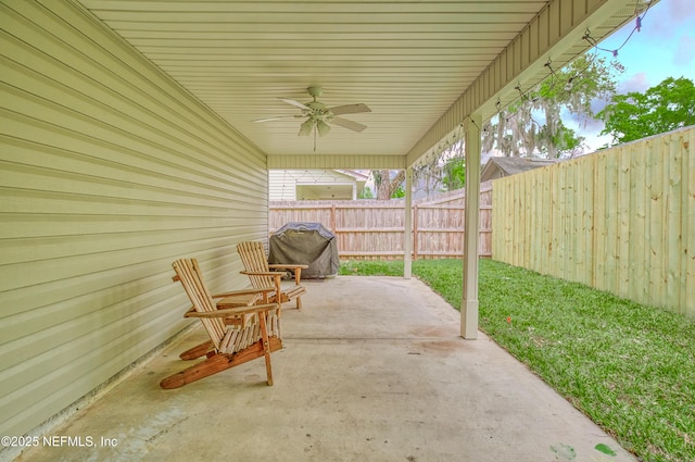 view of patio featuring ceiling fan