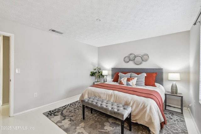 bedroom with a textured ceiling