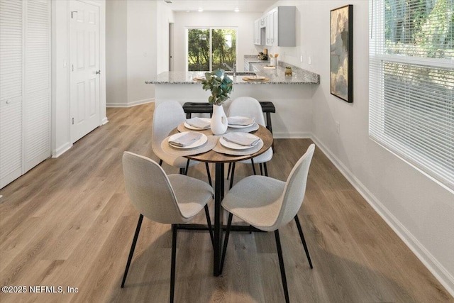 dining area featuring light hardwood / wood-style flooring