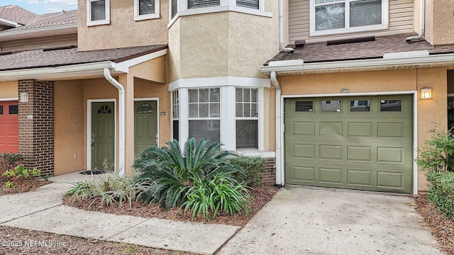 entrance to property with a garage