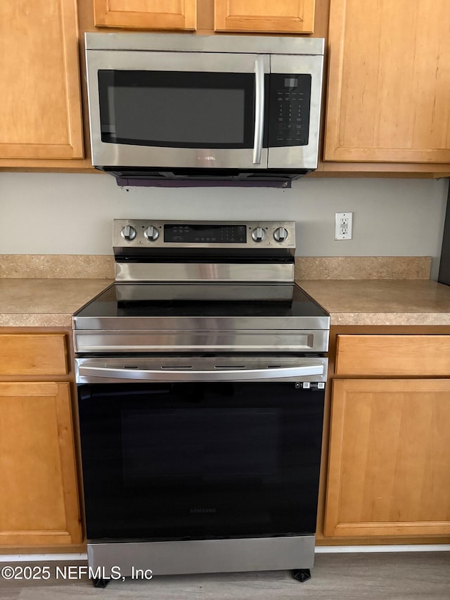 kitchen with appliances with stainless steel finishes