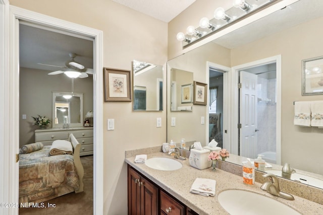 bathroom with vanity and ceiling fan