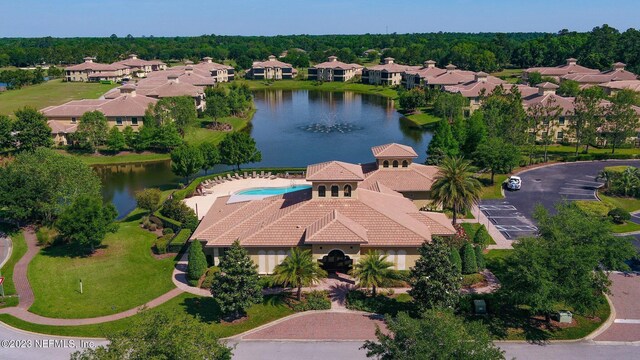 drone / aerial view with a water view