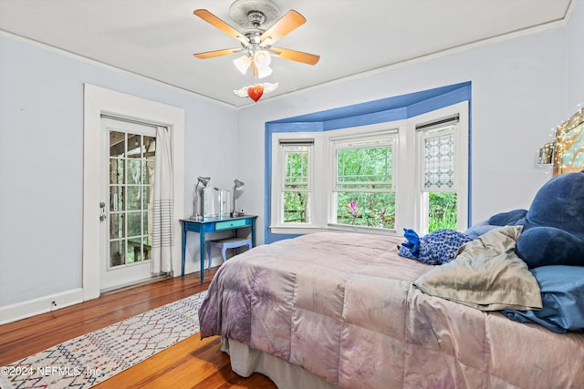 bedroom featuring access to exterior, ceiling fan, ornamental molding, and hardwood / wood-style flooring