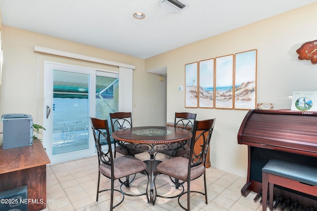 dining room with light tile patterned floors