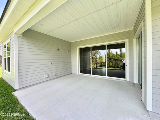 44 Vega Ct, Saint Augustine, FL 32095 - view of patio with a carport