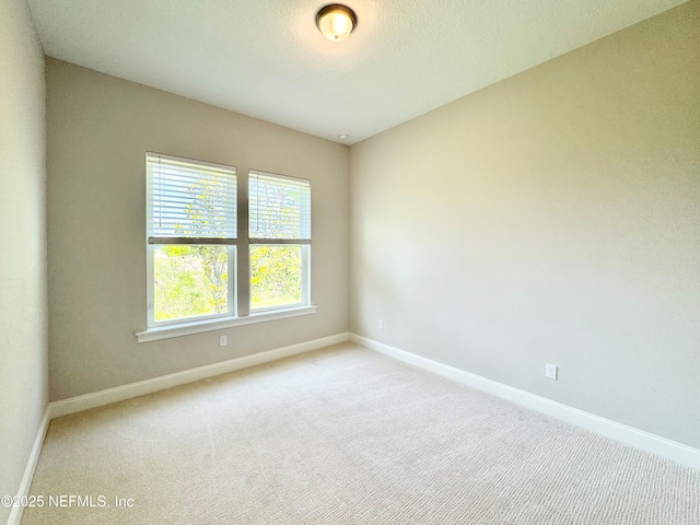 44 Vega Ct, Saint Augustine, FL 32095 - empty room featuring baseboards and carpet