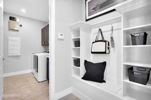 interior space featuring cabinets and washing machine and dryer