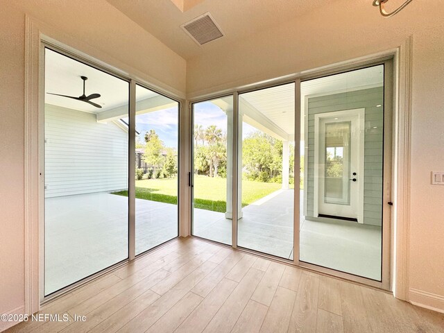 269 Pasarela Dr, Saint Augustine, FL 32095 - doorway featuring a ceiling fan, visible vents, a healthy amount of sunlight, and light wood-style floors