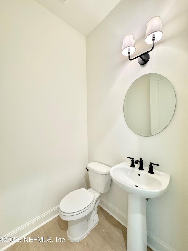 269 Pasarela Dr, Saint Augustine, FL 32095 - half bath with baseboards and toilet