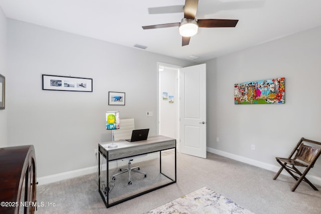 office with light carpet and ceiling fan