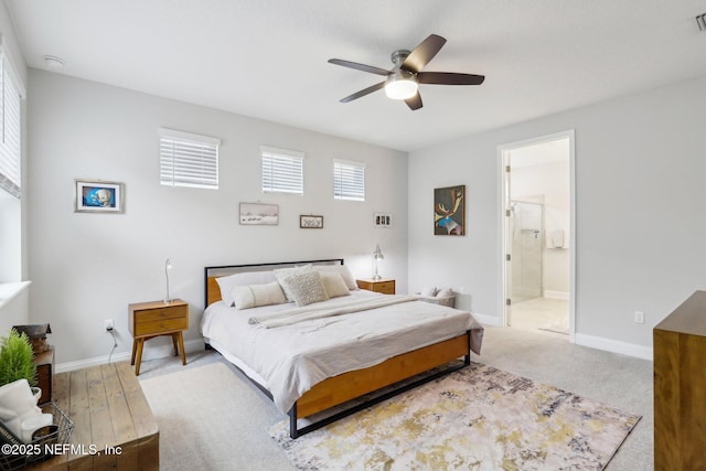 bedroom featuring connected bathroom and ceiling fan