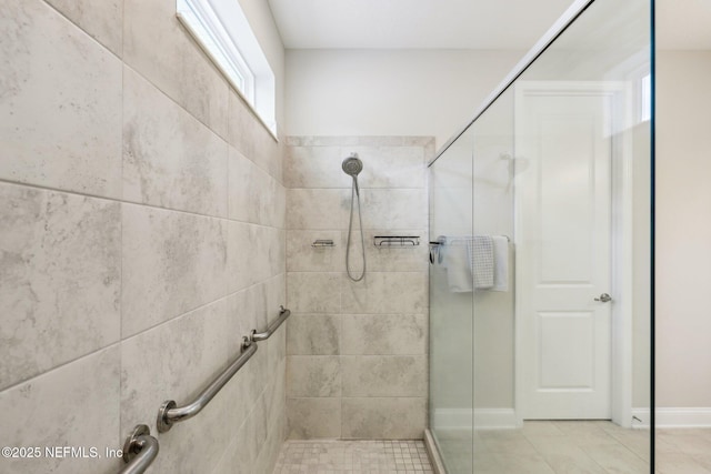 bathroom featuring tiled shower