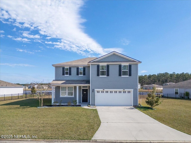 view of front property with a front yard and a garage