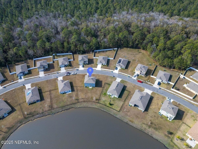 drone / aerial view featuring a water view