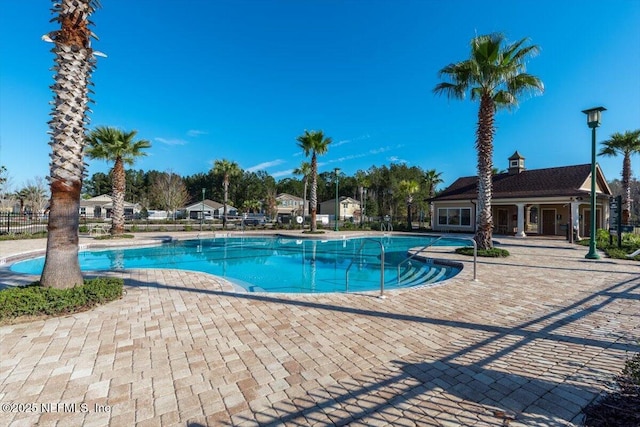 view of swimming pool featuring a patio area