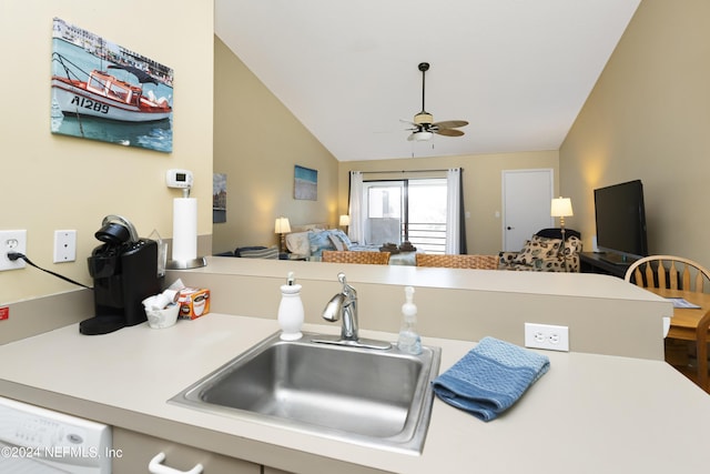 kitchen with dishwasher, lofted ceiling, sink, ceiling fan, and kitchen peninsula