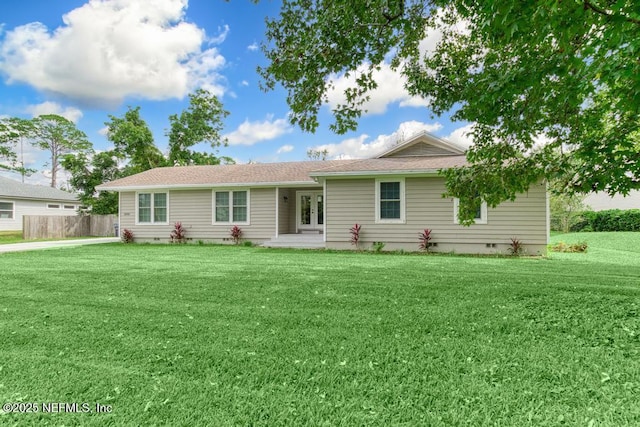 single story home featuring french doors and a front lawn