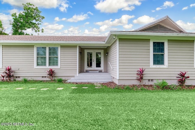 ranch-style home with a front yard