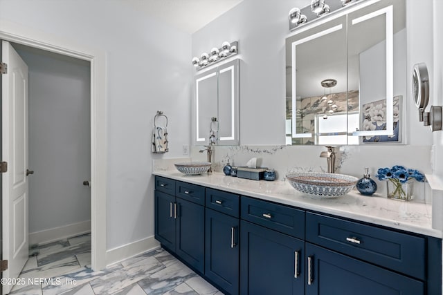 bathroom featuring vanity and a shower