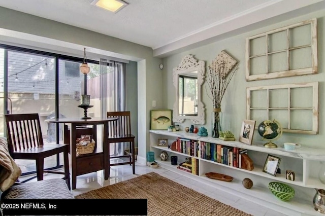 sitting room featuring light tile patterned floors