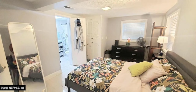 bedroom with a textured ceiling