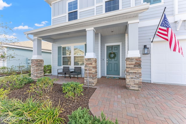 property entrance featuring covered porch