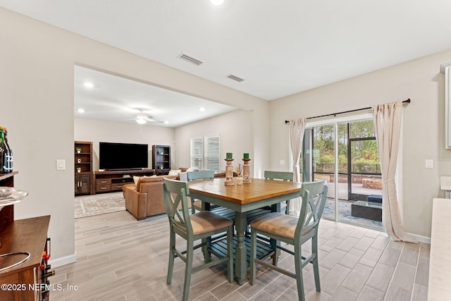 dining room with ceiling fan