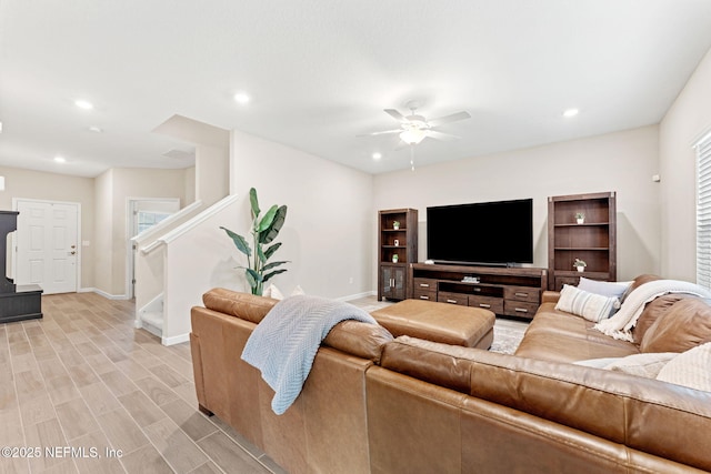 living room featuring ceiling fan