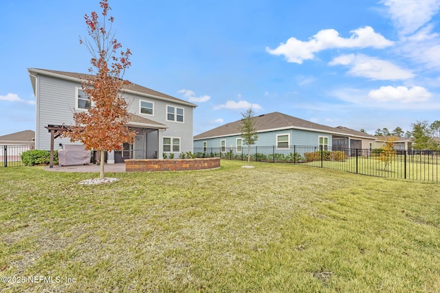 back of property with a lawn, a sunroom, and a pergola