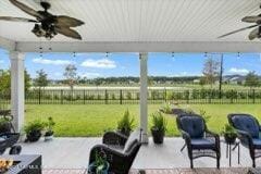 view of patio with ceiling fan