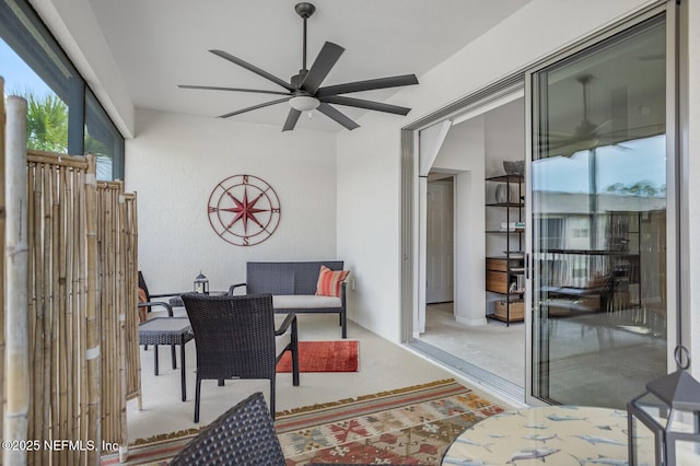 view of patio / terrace featuring ceiling fan